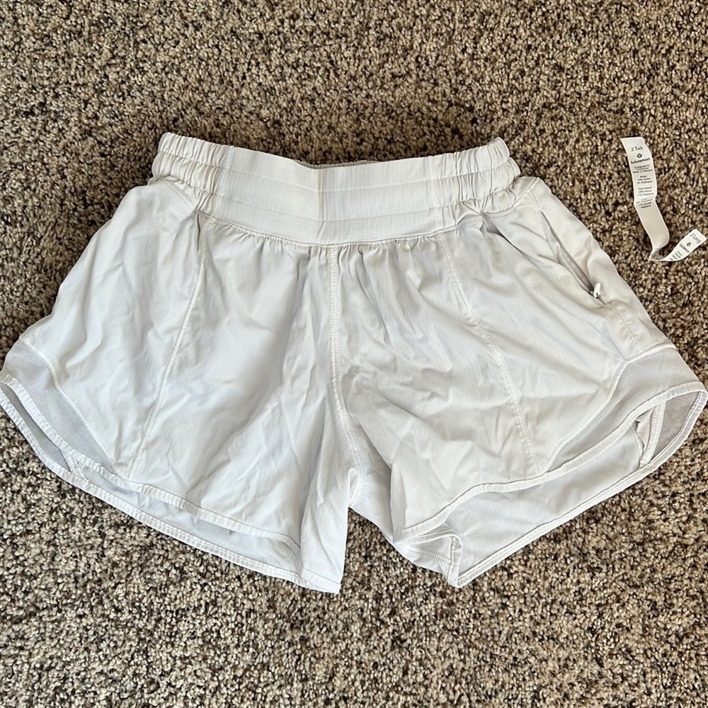Lululemon hottie hot shorts Size 2 tall white with nude briefs